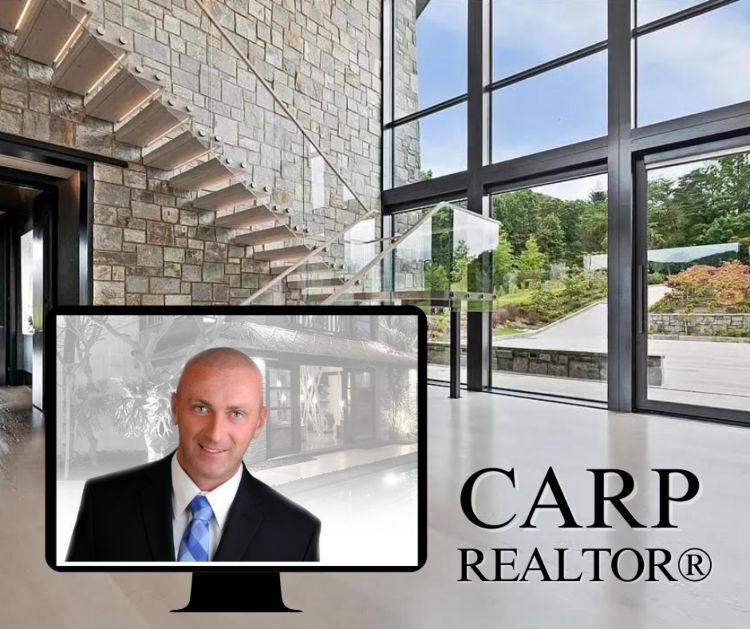Best Carp Realtor, Jason Polonski. Photo of a house interior in carp with Jason Polonski on a computer screen.