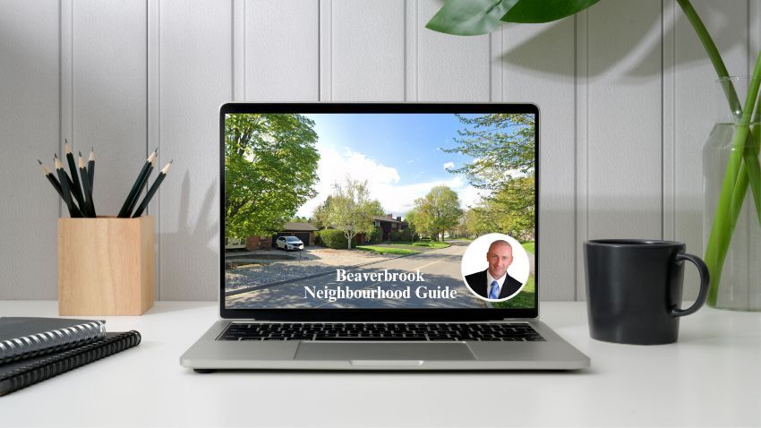 Beaverbrook neighbourhood guide. Computer screen with an image of a street in Beaverbrook, Kanata, Ottawa, ON and photo of Jason Polonski- realtor in Kanata