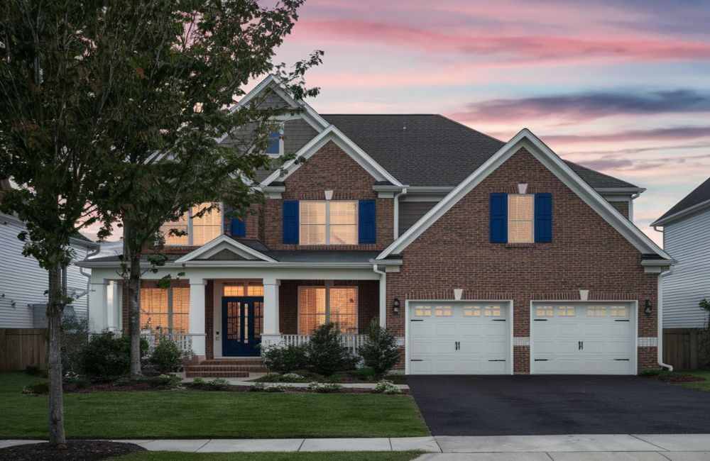 a house with a driveway and trees, 8 Reasons to Buy a Home in Barrhaven, House in Barrhaven